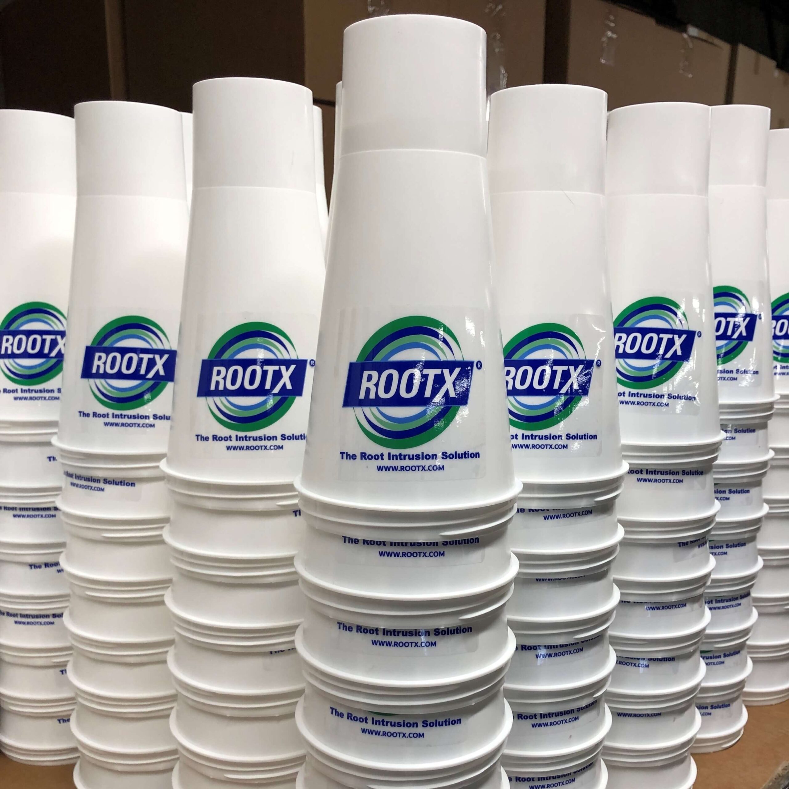 Stacks of white RootX containers