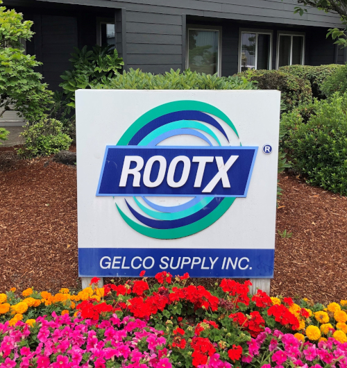 A signboard with the text RootX Gelco Supply Inc