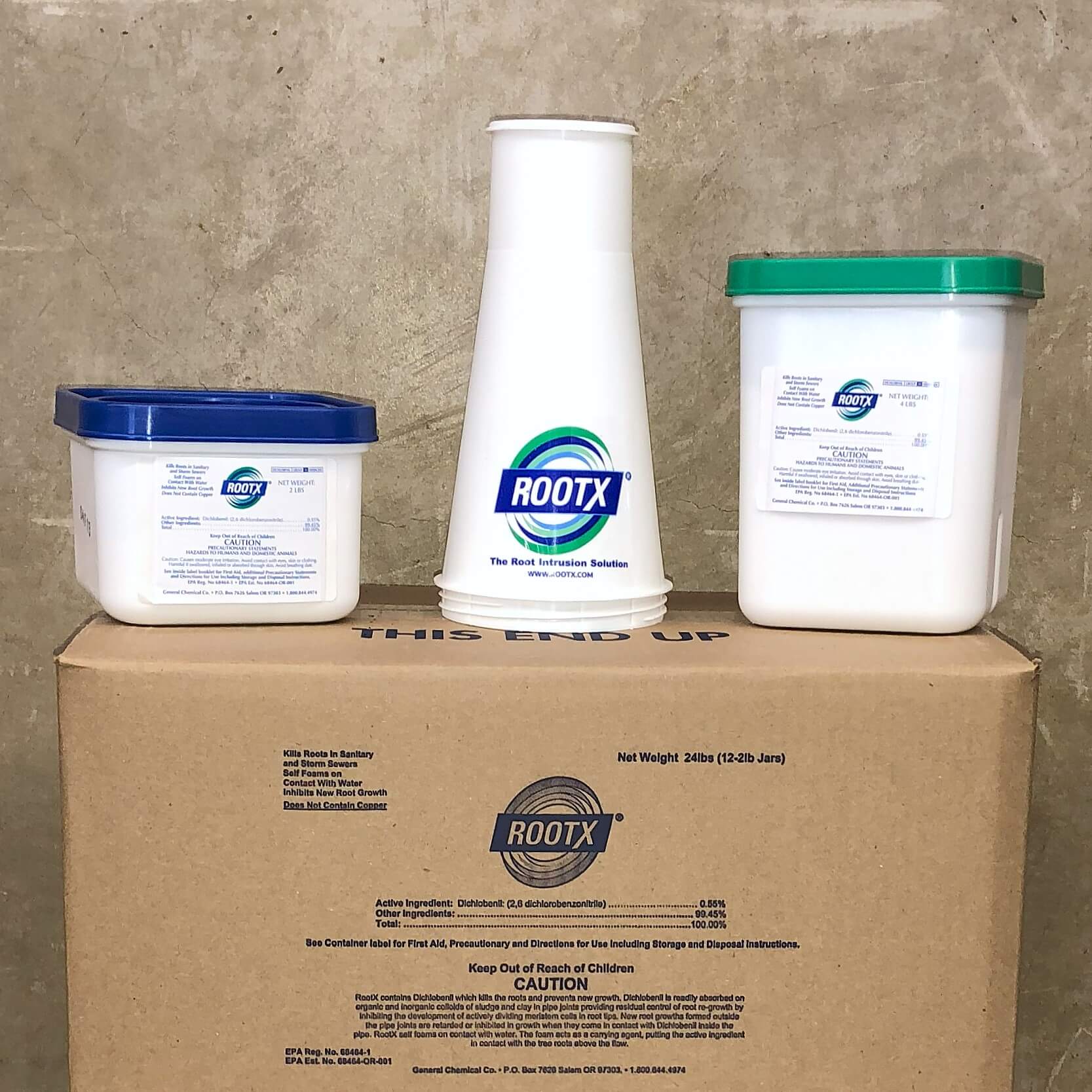 3 RootX products in different containers are displayed on a cardboard box