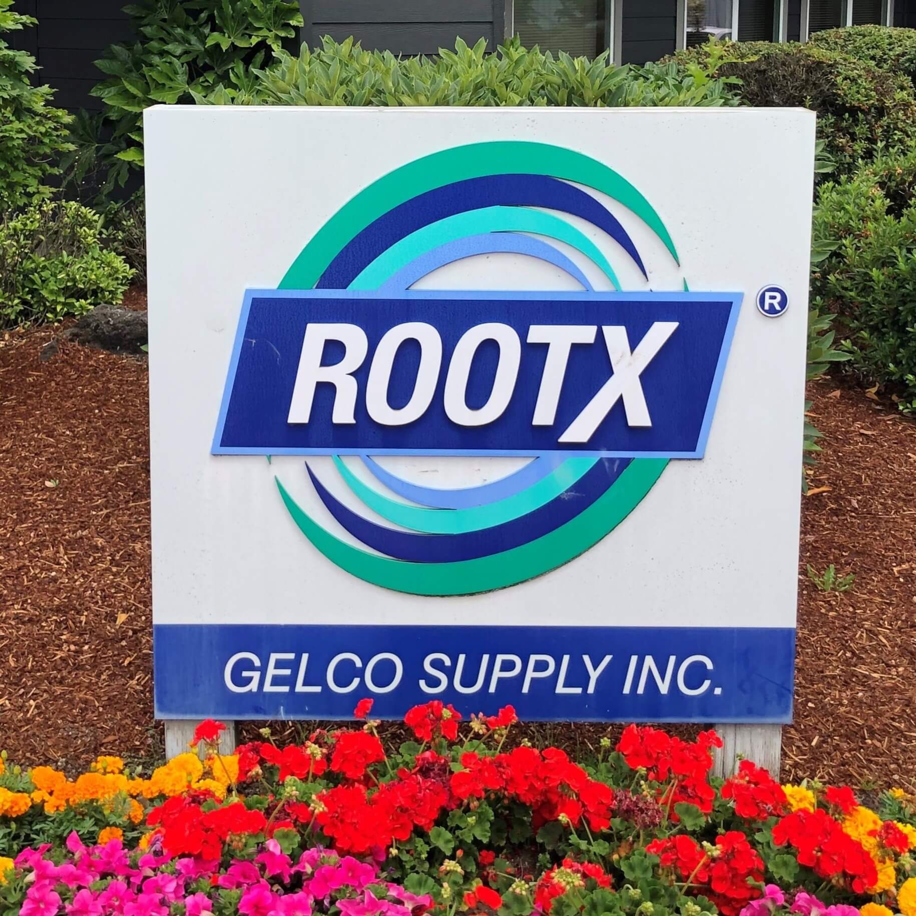 A signboard with the text RootX Gelco Supply Inc